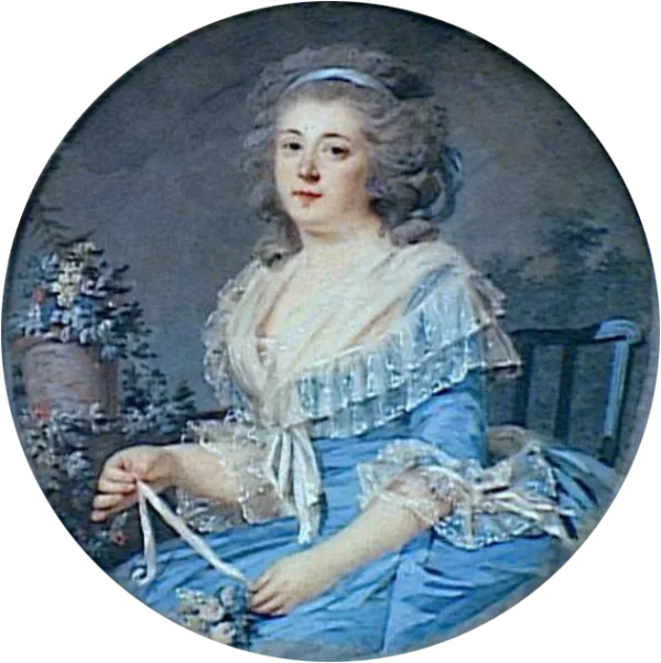 Jeune femme attachant un bouquet de fleurs